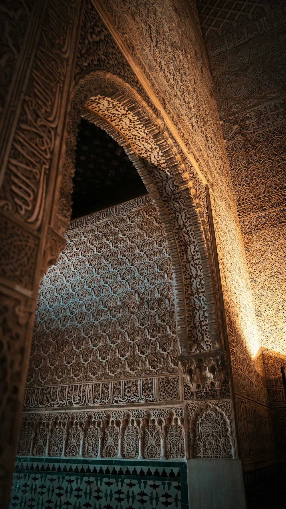 a large ornate ceiling with intricate carvings