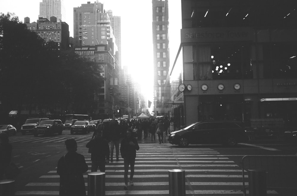 a group of people crossing a street