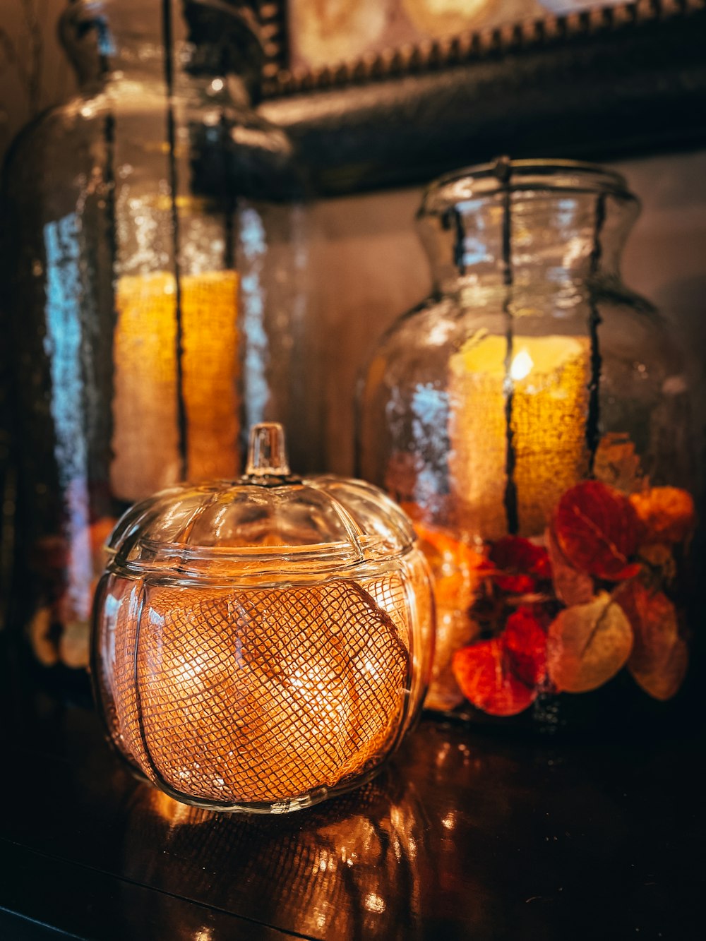 a glass jar with a yellow liquid