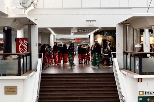 A group of young adults enjoying shopping together in a colorful store.