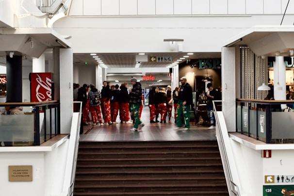 A group of friends enjoying a shopping day at a mall.