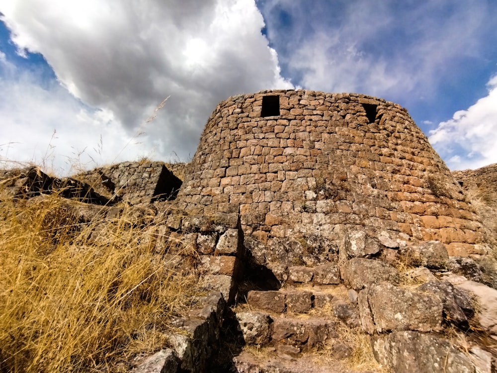 a stone building with windows