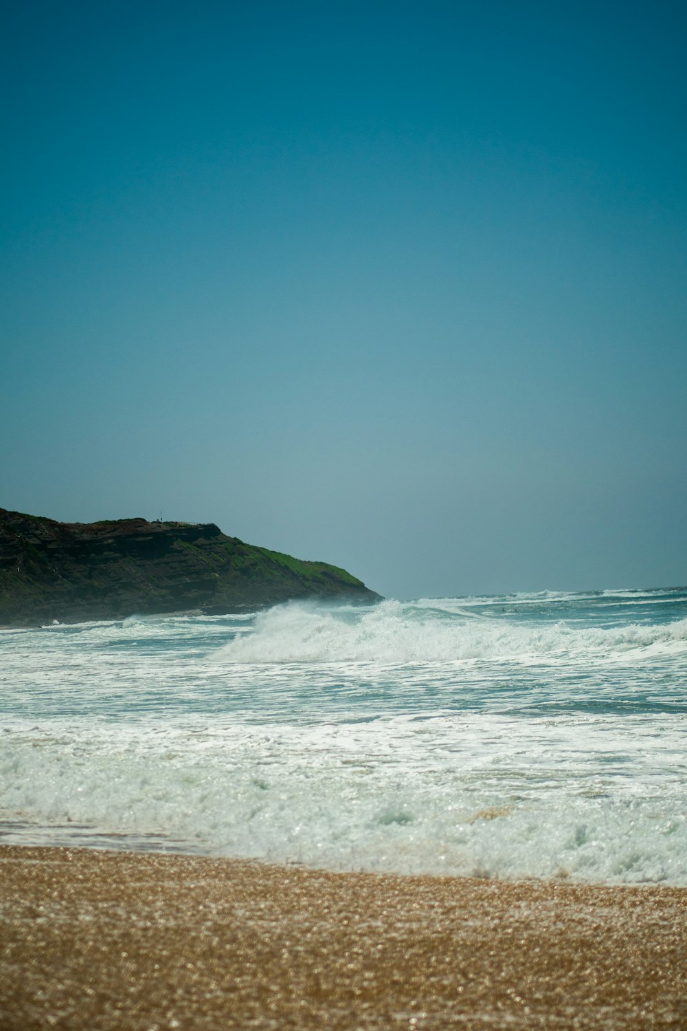 waves crashing on a beach