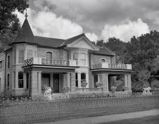 a house with a fence in front