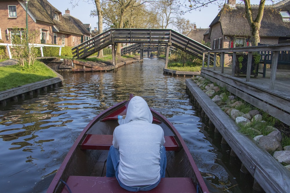 a person in a boat on a river