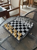 a chess board on a table