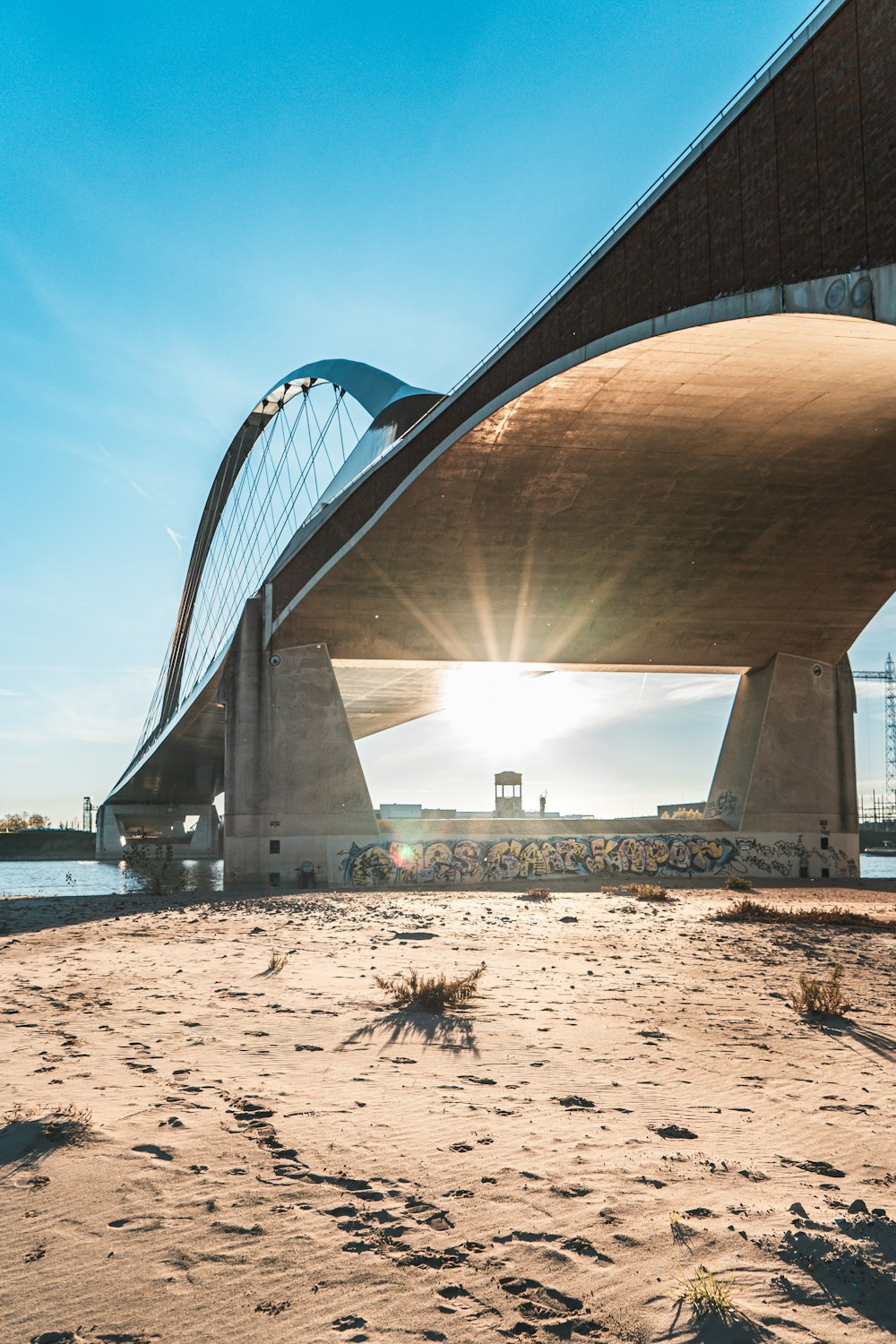 a large bridge over a beach