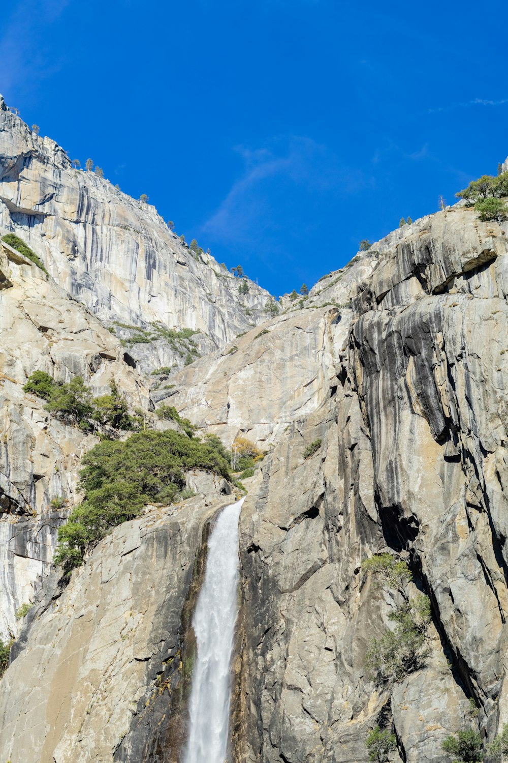 a waterfall in a rocky area