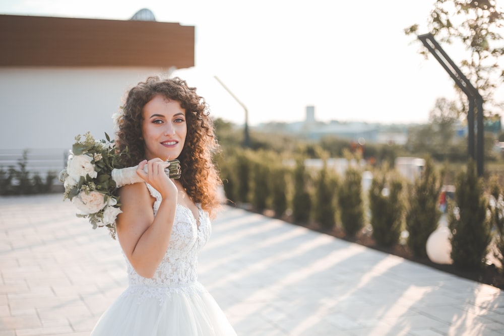 a woman holding flowers