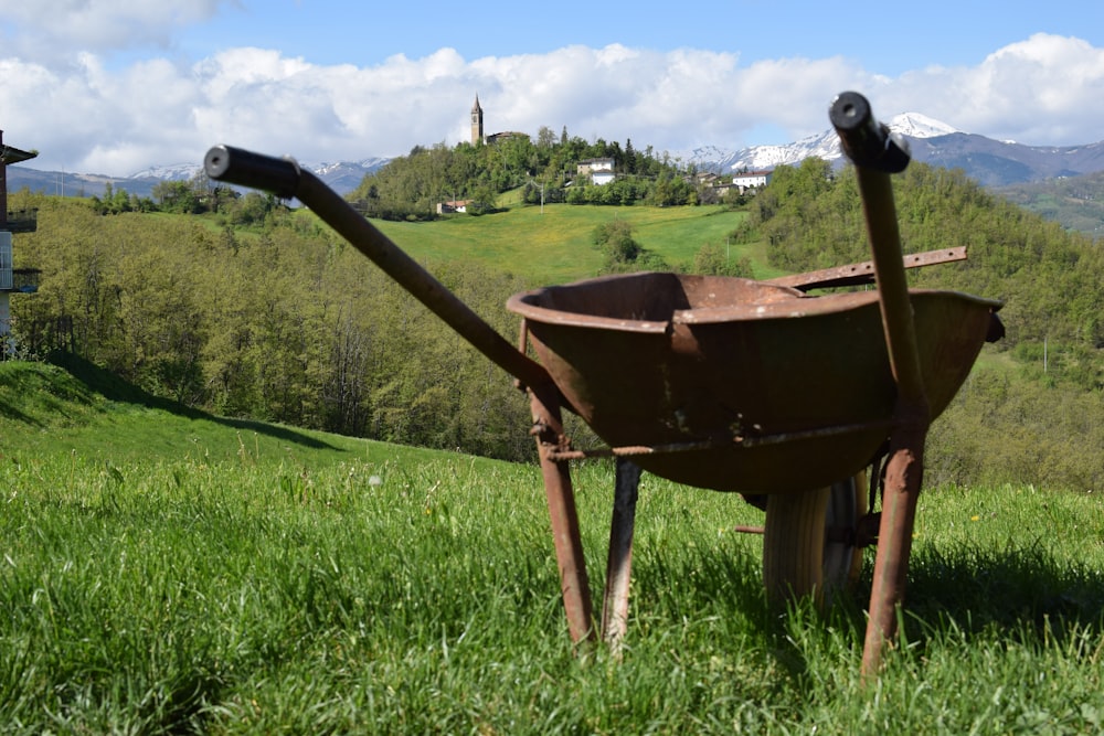a wooden contraption in a field
