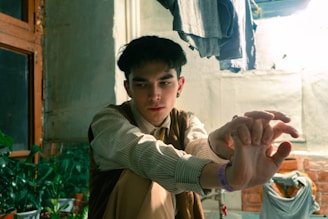 A thoughtful student reviewing career options with a mentor in a cozy, well-lit room.