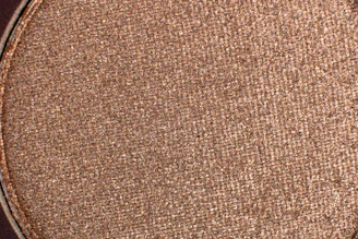 Close-up image of shimmering nano powder particles under a microscope.