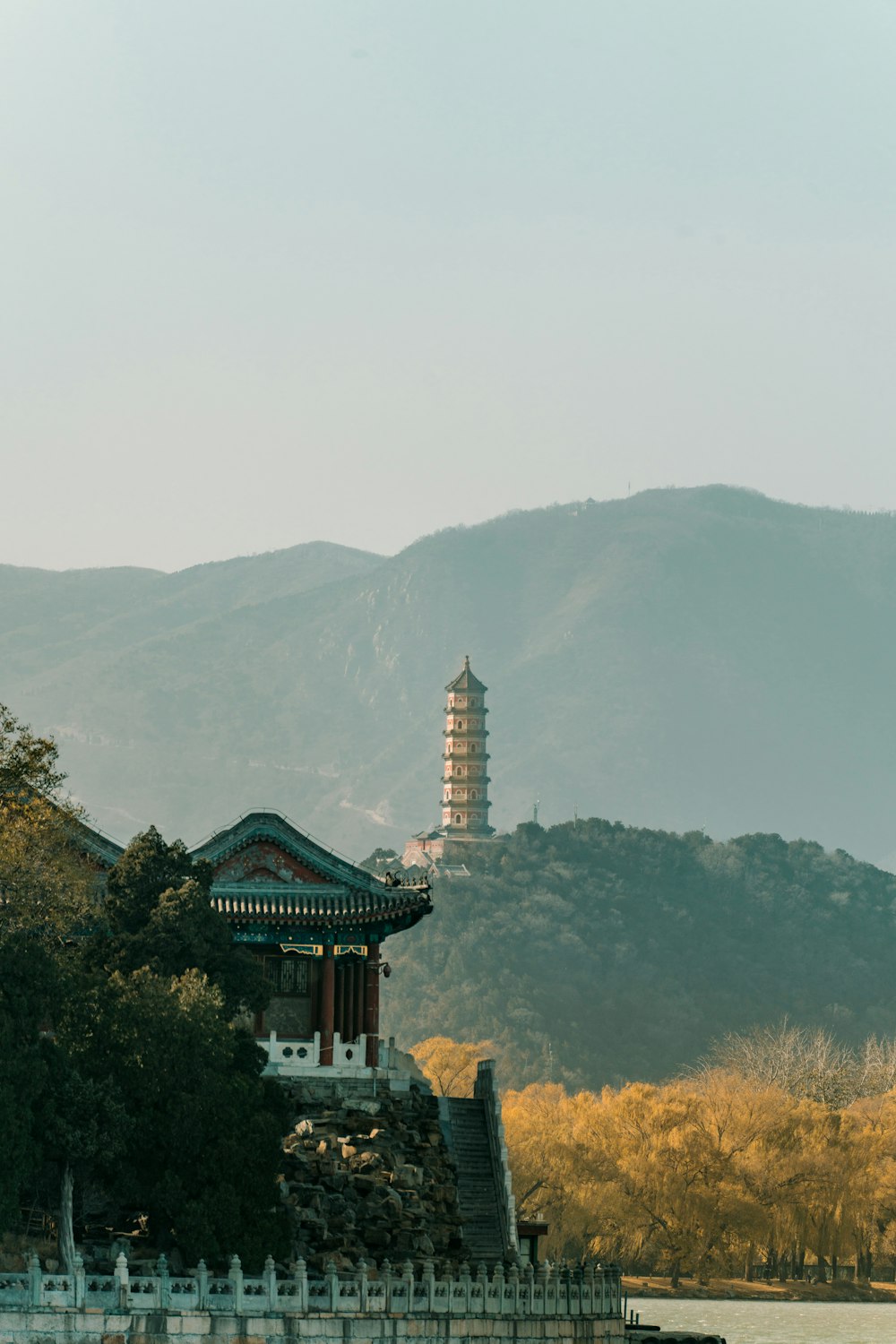 a building with a tower in the background