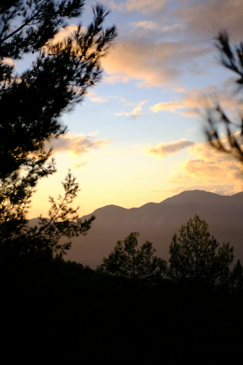 a view of the mountains and the sky