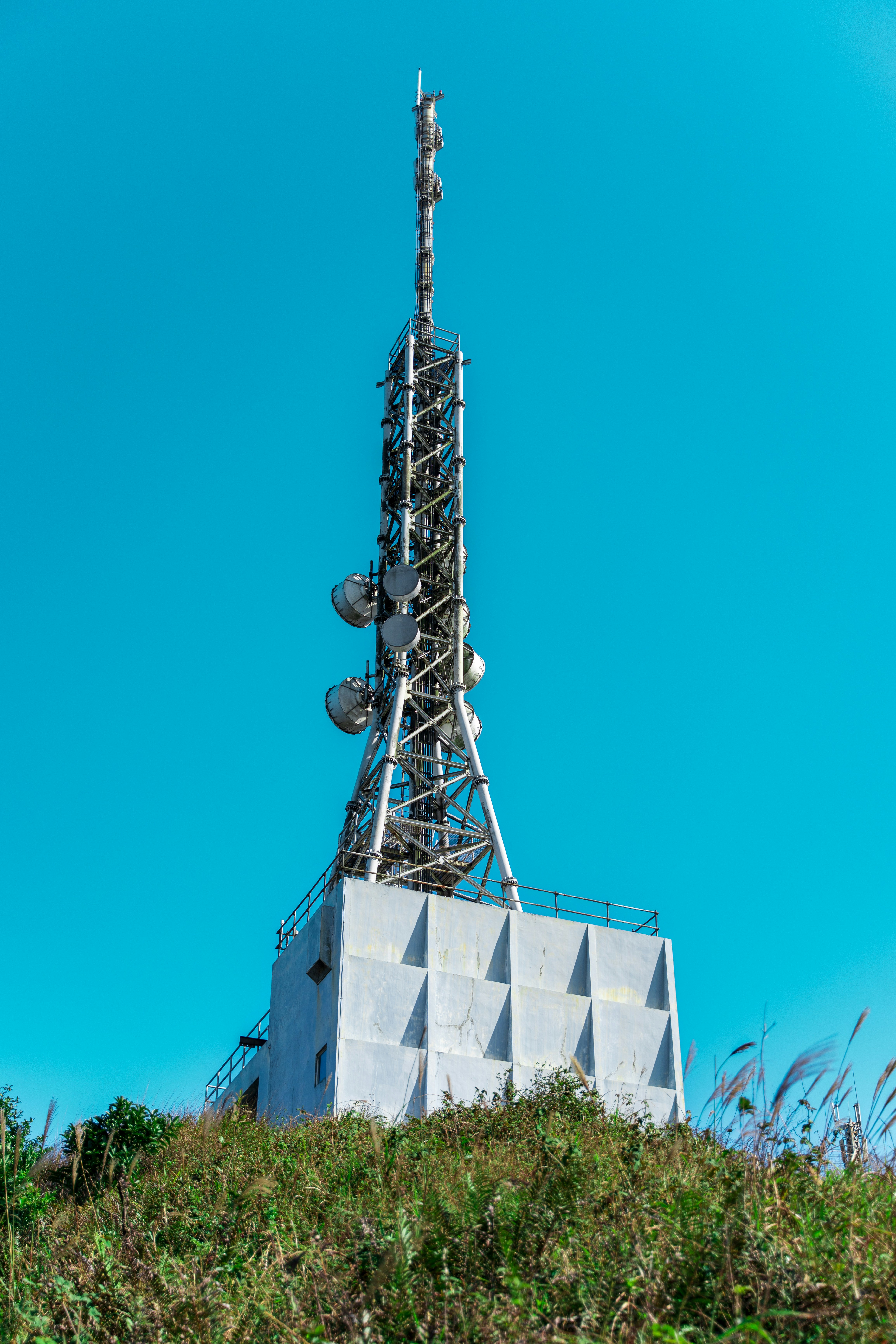 a tall tower with a metal frame
