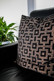 a black and white striped pillow