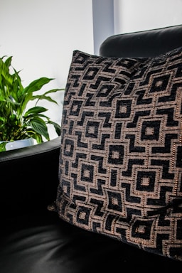 a black and white striped pillow