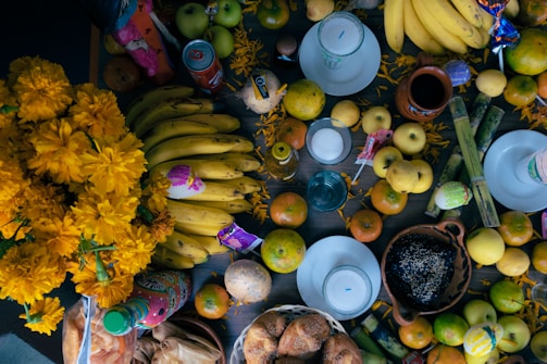 a bunch of fruits and flowers