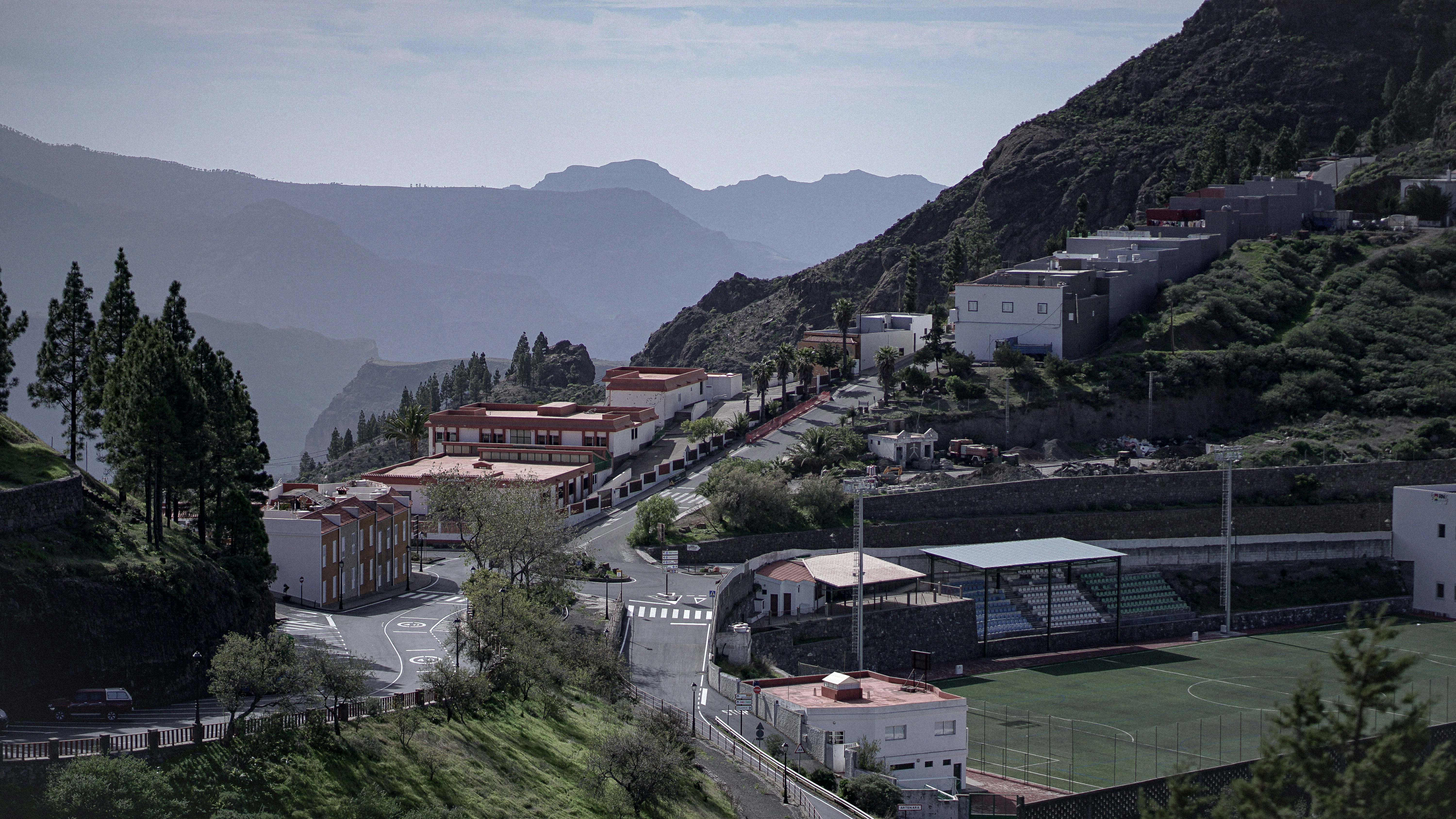 a large building with a parking lot