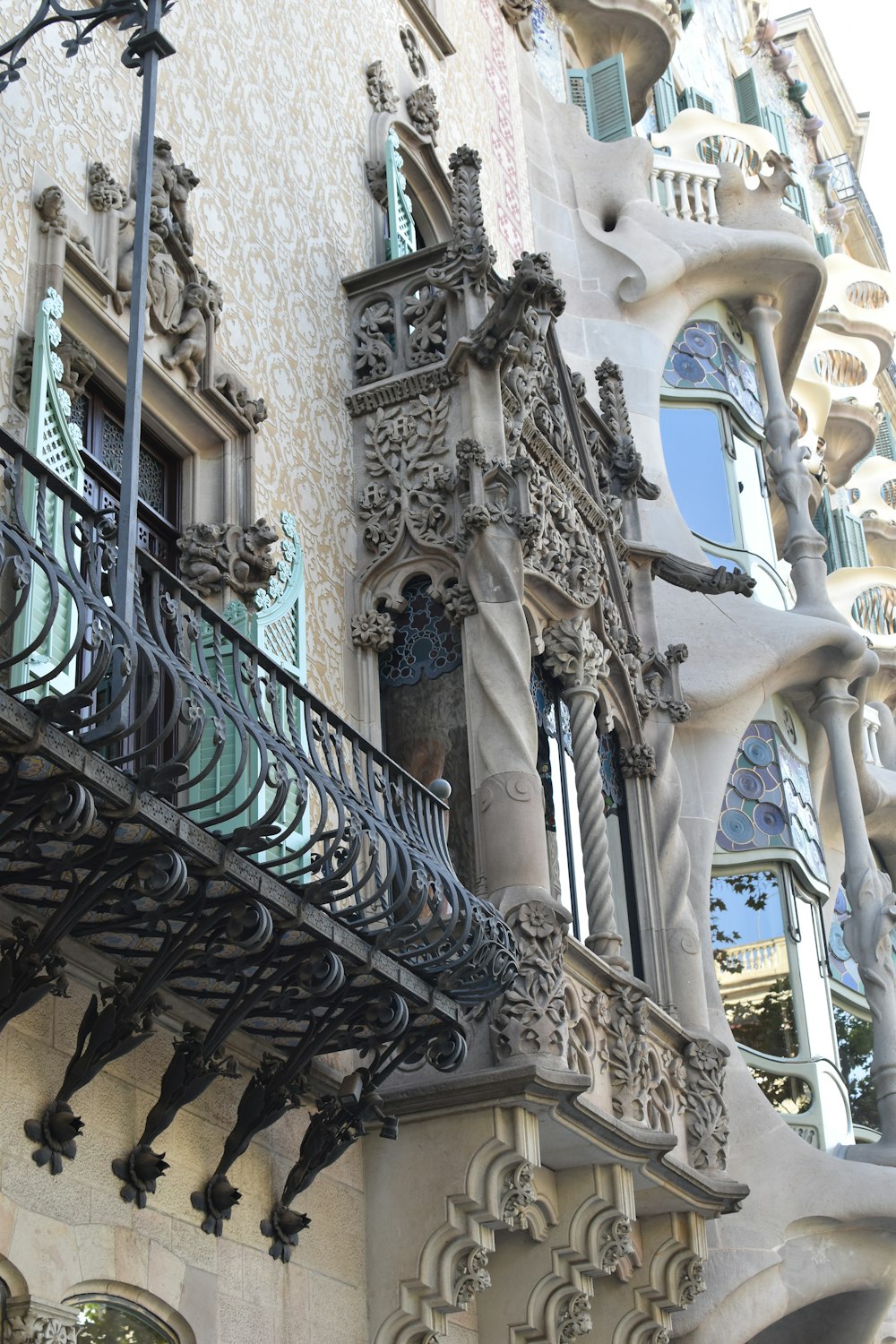 a building with a staircase and statues