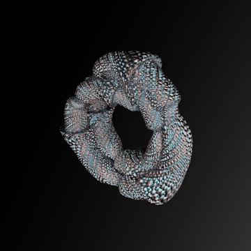 An abstract 3D structure with a torus shape, composed of intricate, textured patterns in a metallic and organic style, set against a dark gradient background.