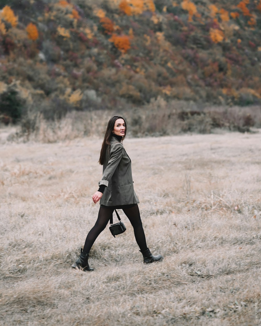 a person walking on a dirt road