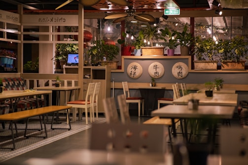 a restaurant with tables and chairs