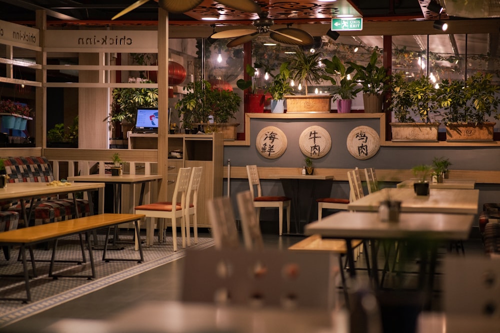 a restaurant with tables and chairs