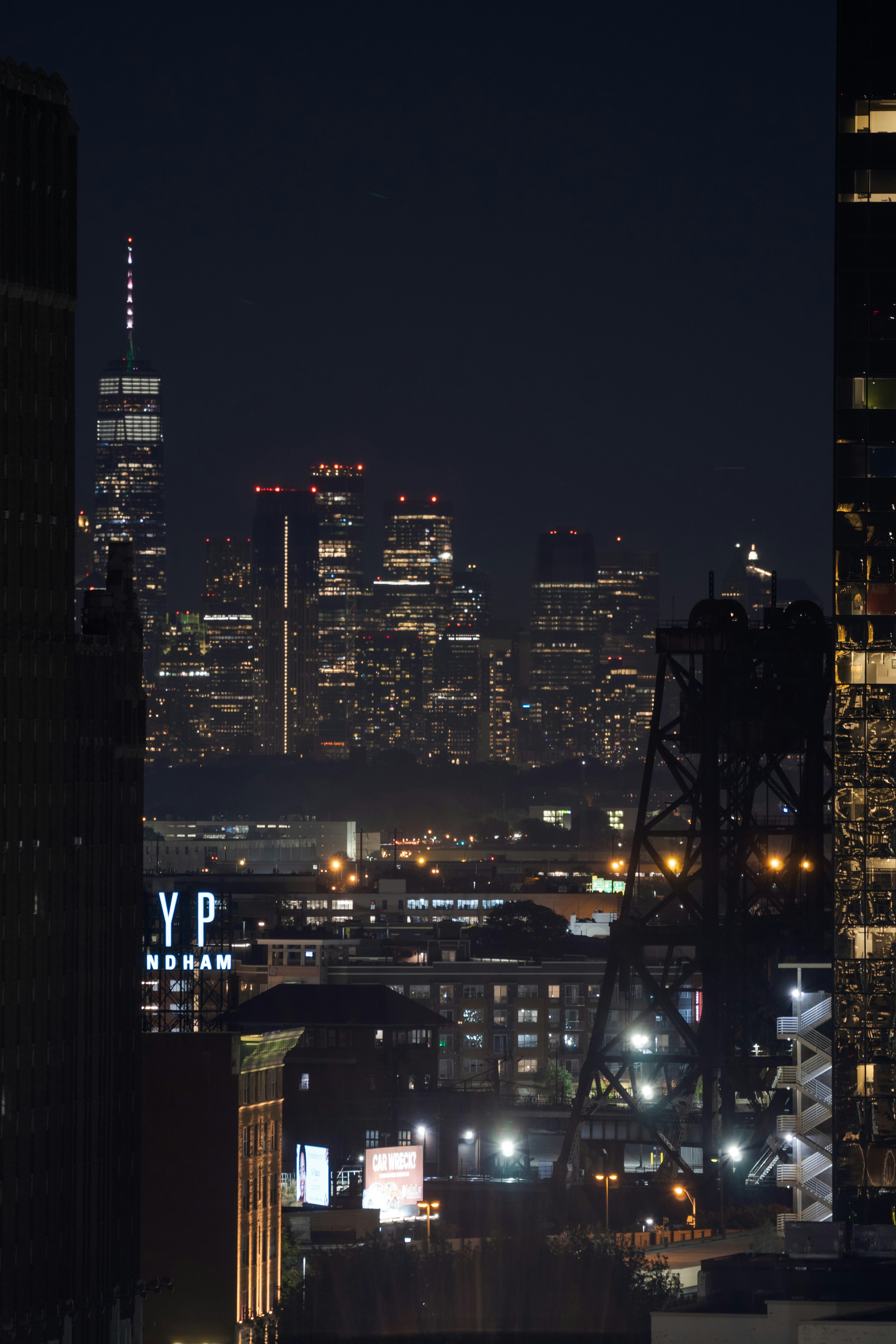 New york city skyline glows at night.