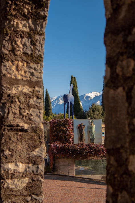 a stone wall with a painting on it