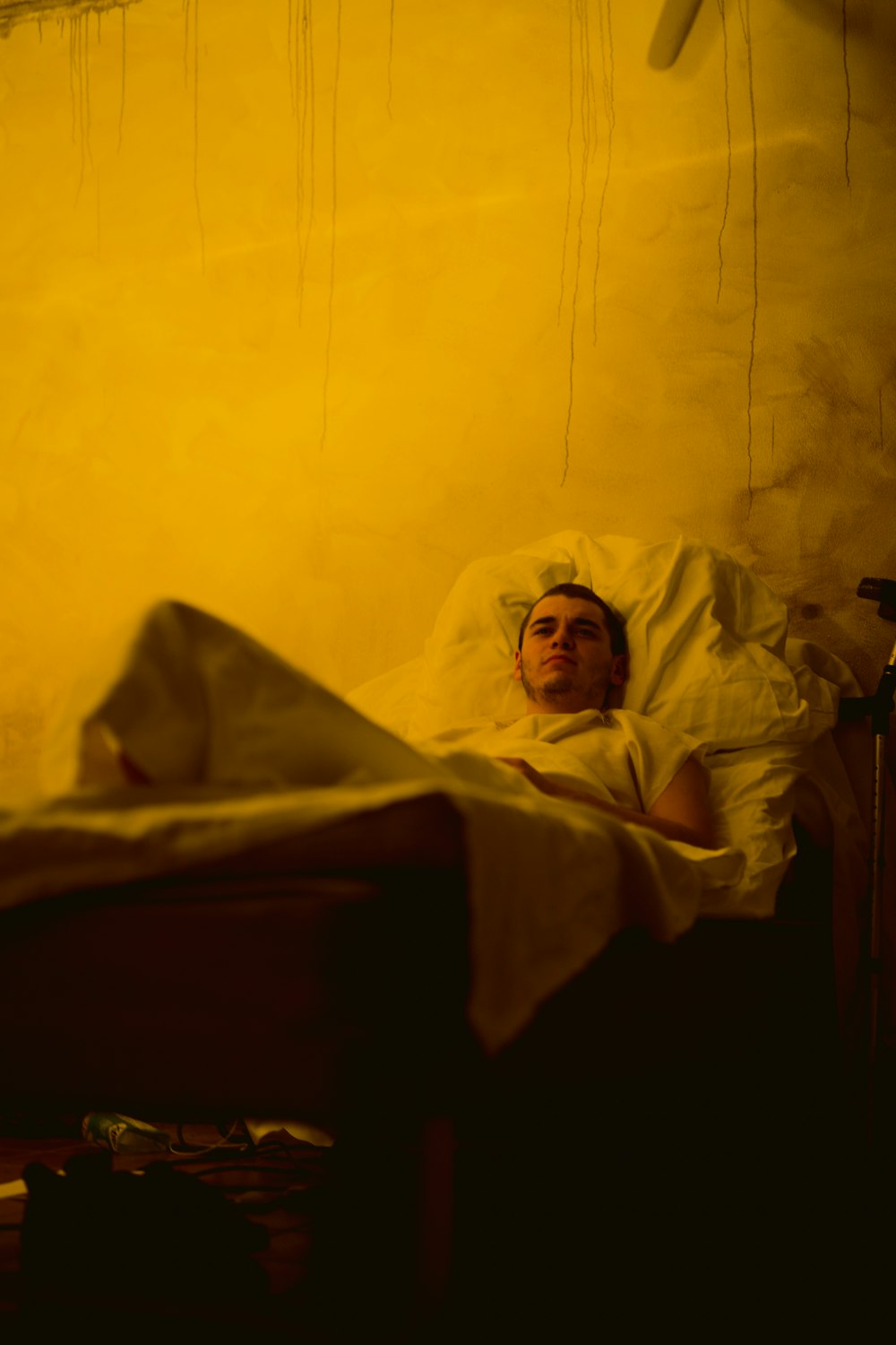 a person lying in a bed