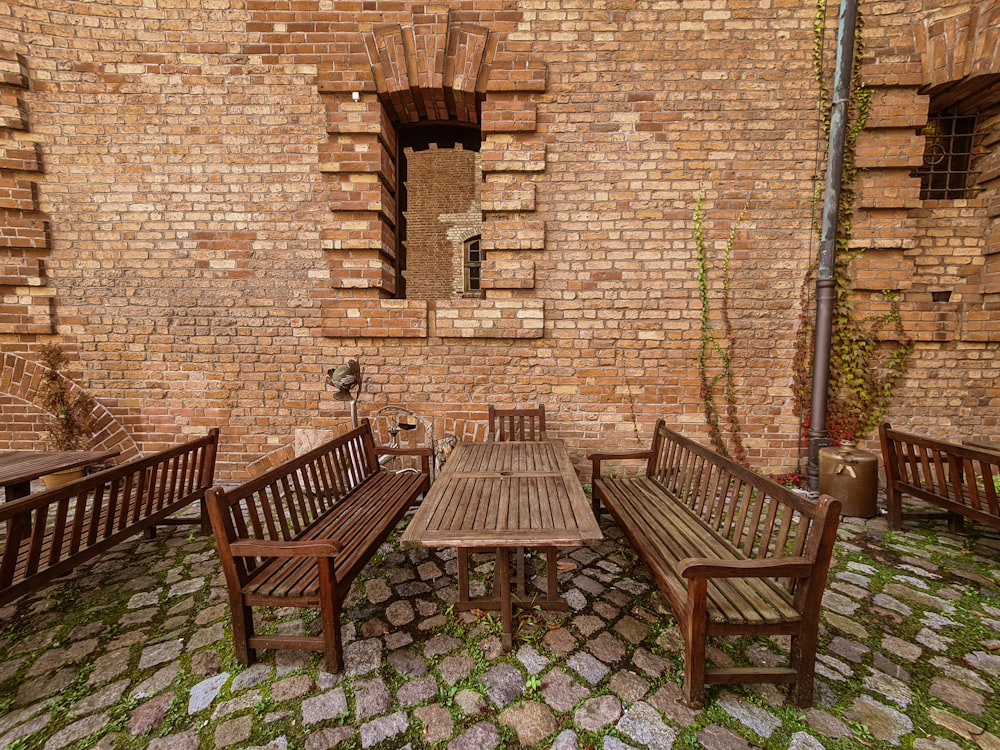 a group of benches sit unoccupied