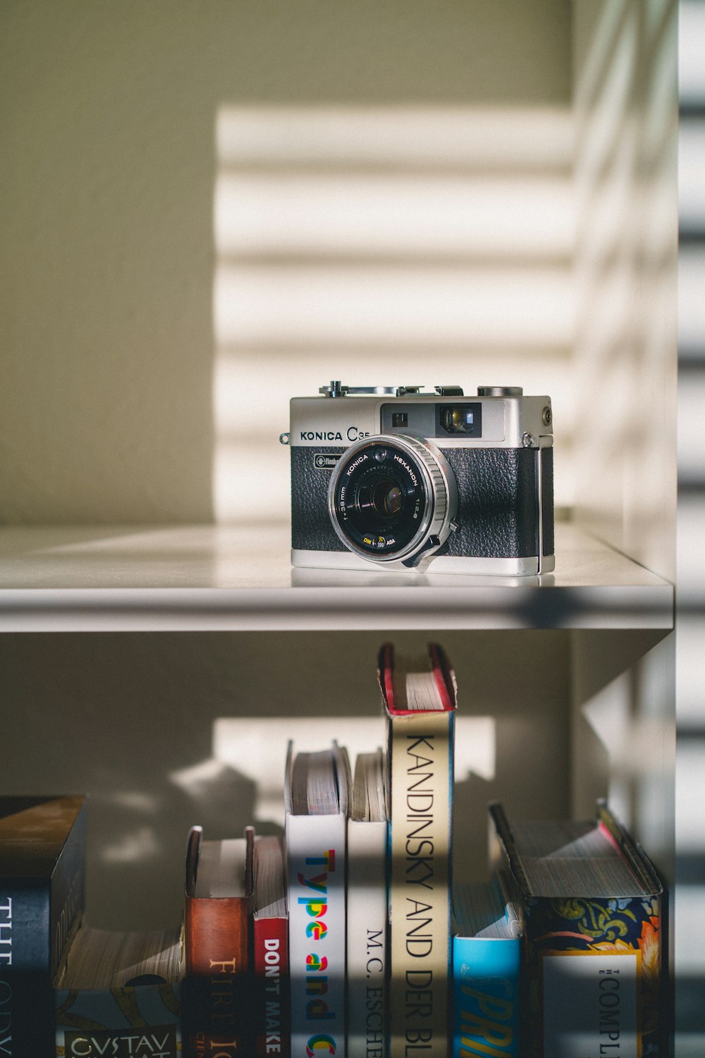 a camera on a shelf