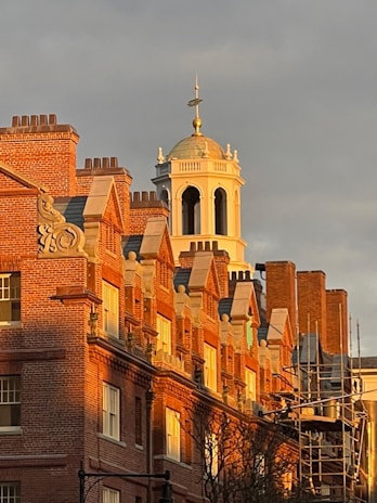 Historic campus building bathed in warm sunlight, symbolizing CIBC’s rich heritage.