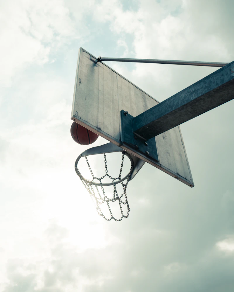 Basketball players in action during a game