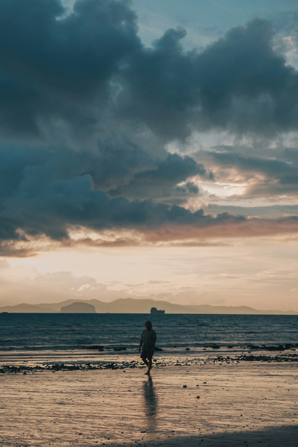 a person standing on a beach