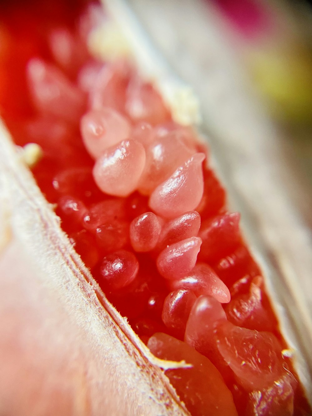 a close up of a person's hand with red blood on it