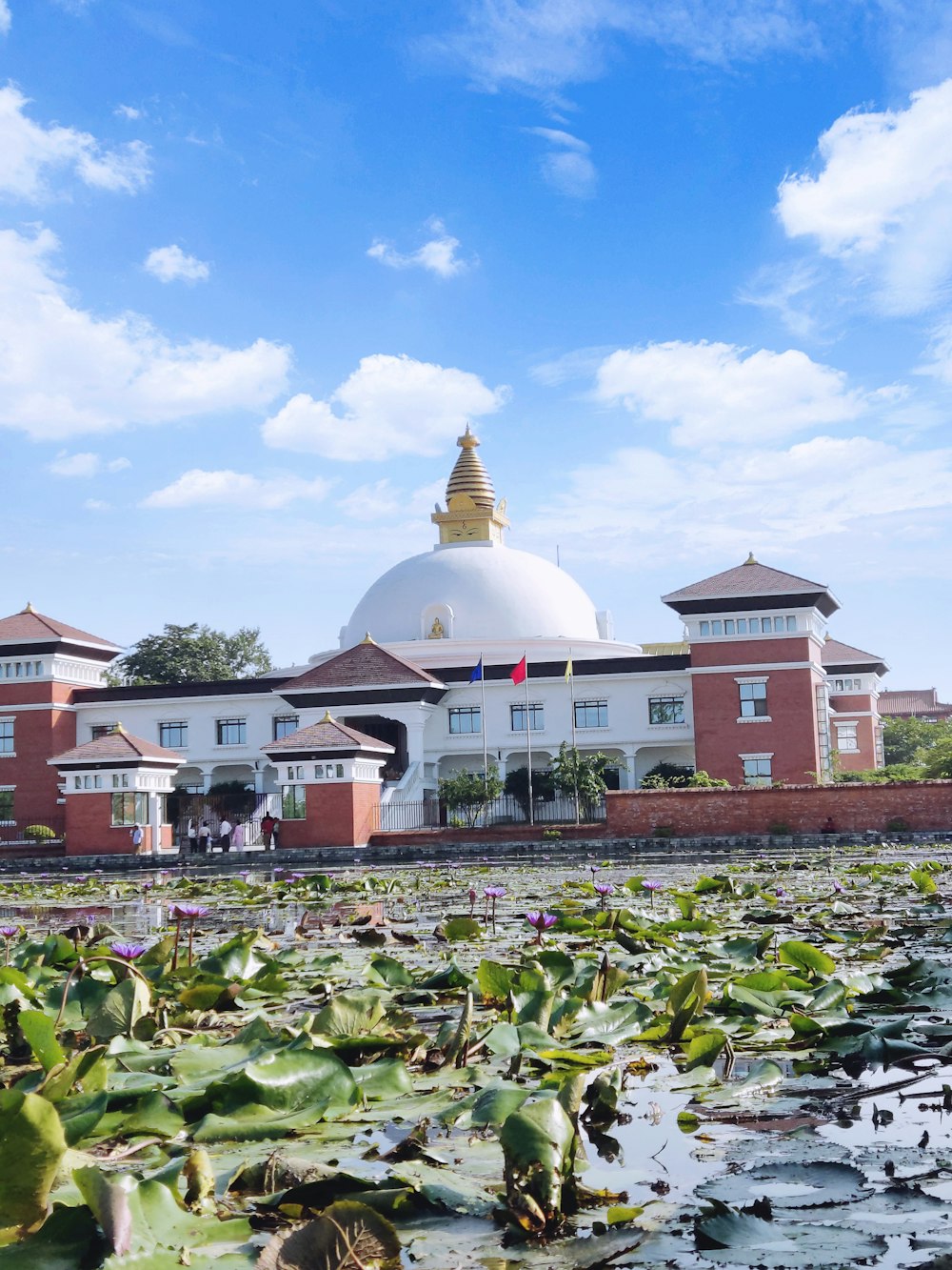 a group of buildings with a domed roof and a dome on top