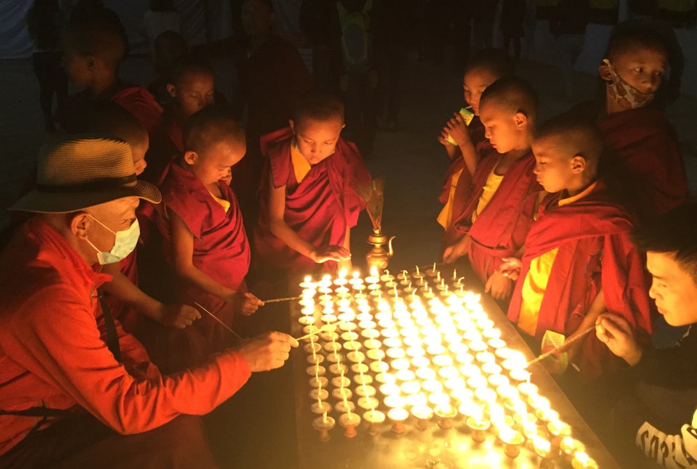 a group of children playing with a firework