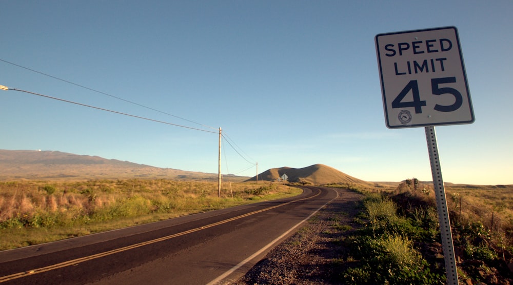 a sign on the side of a road