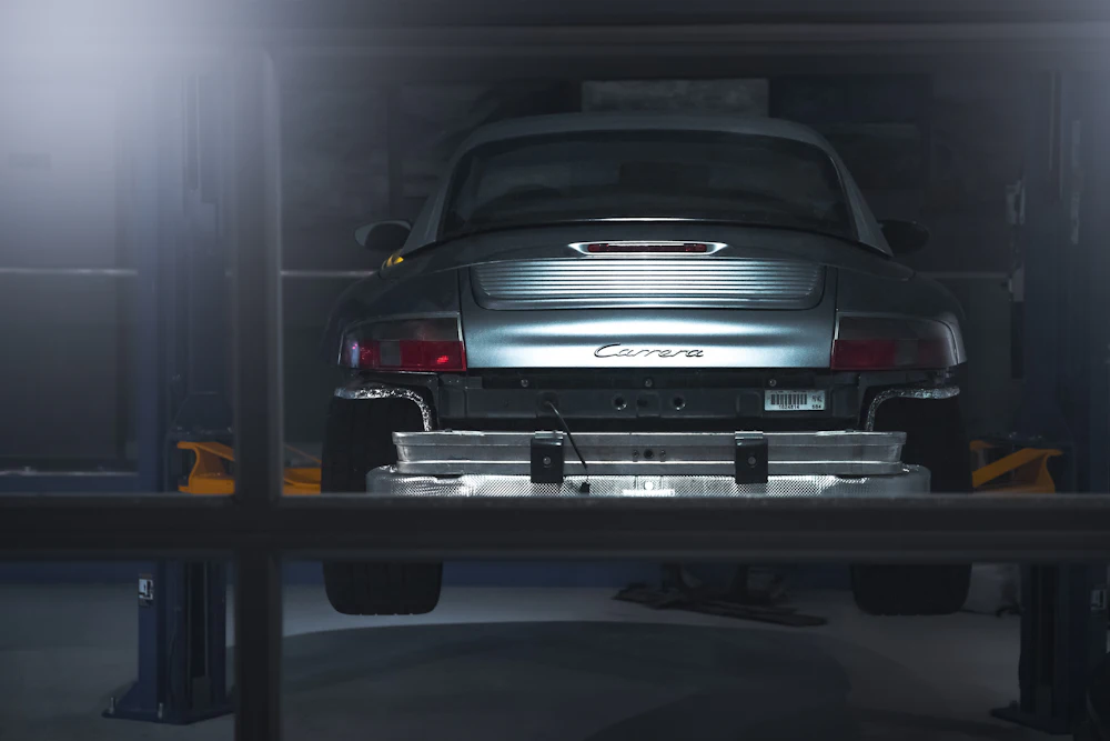 Underside view of a car on a lift