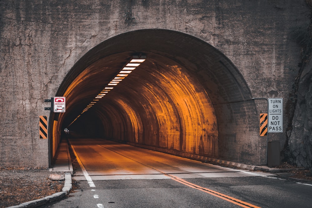 a tunnel with signs