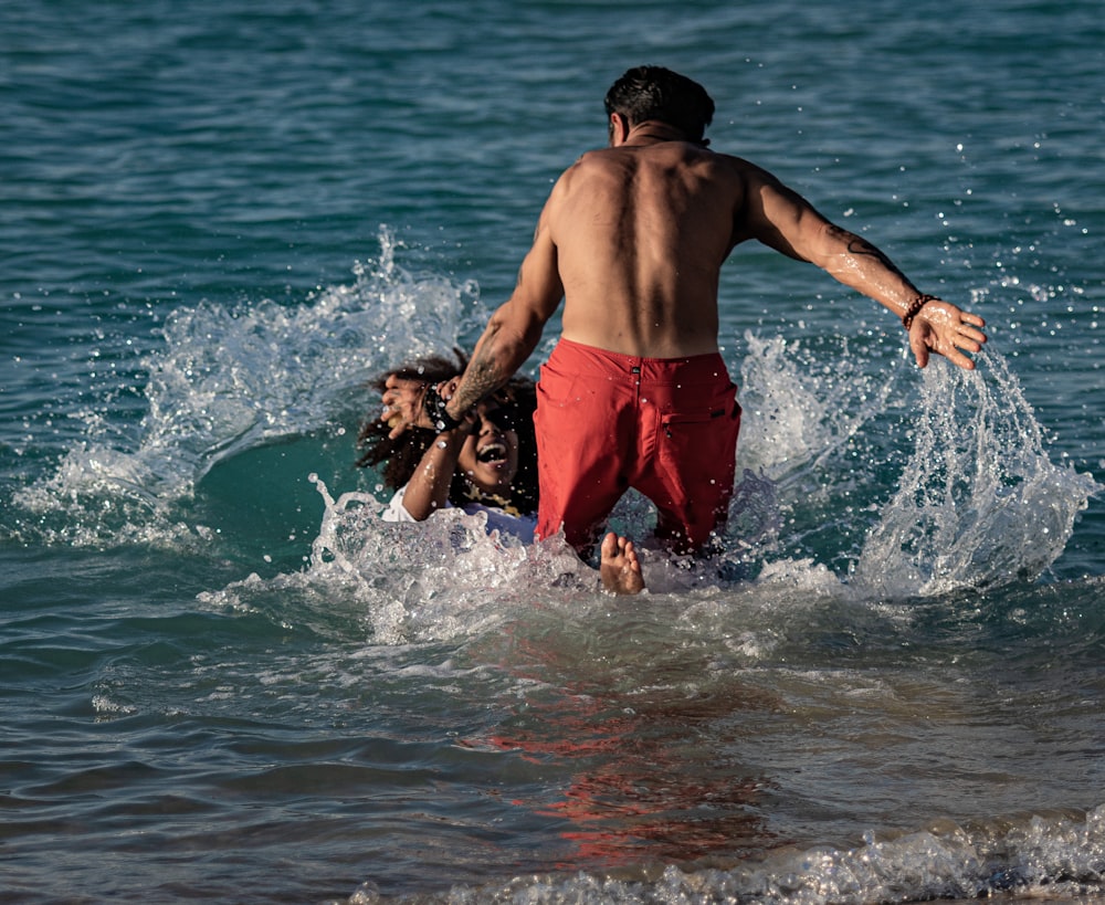 a man and a woman in the water