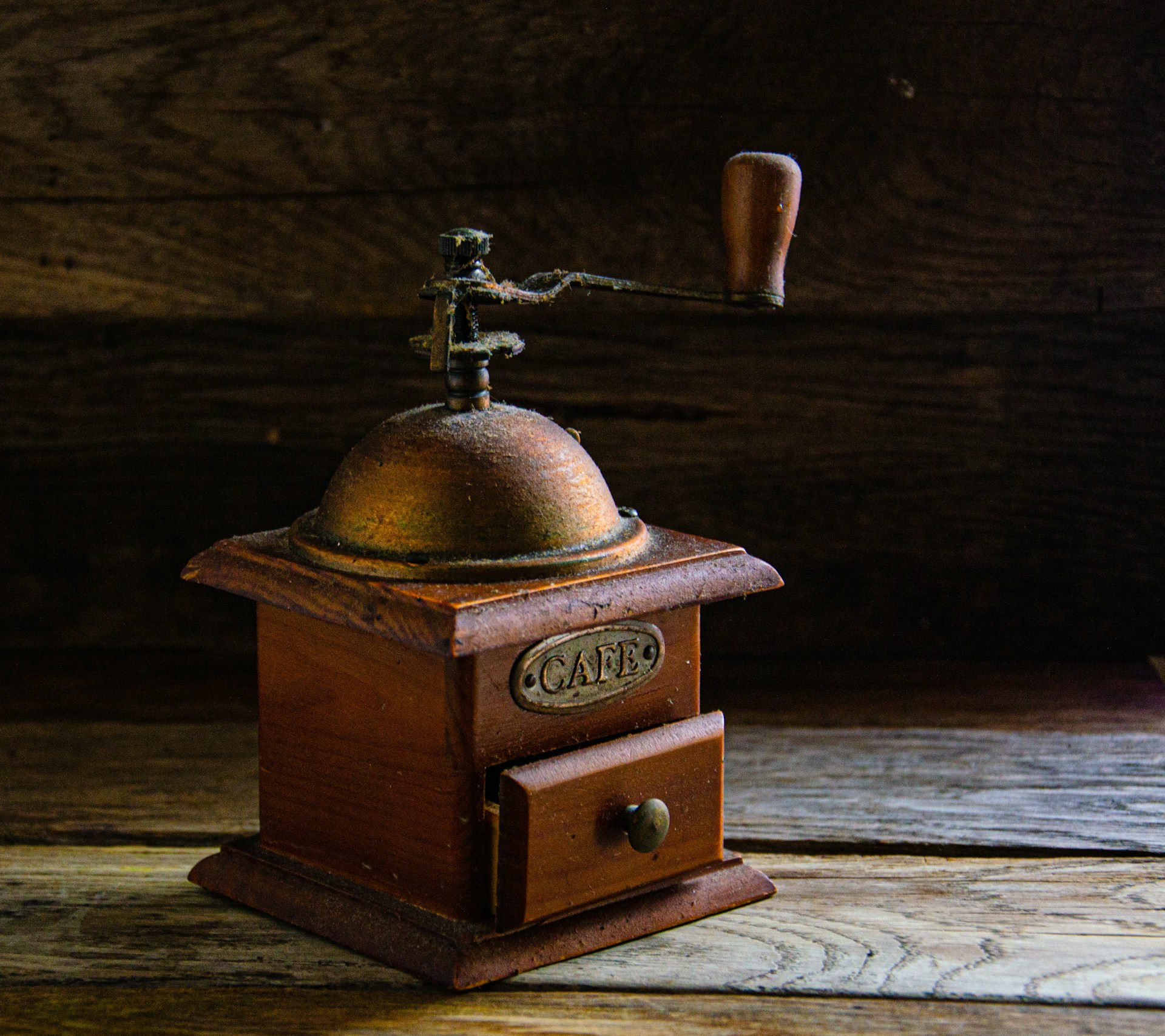 a bell on a wooden box