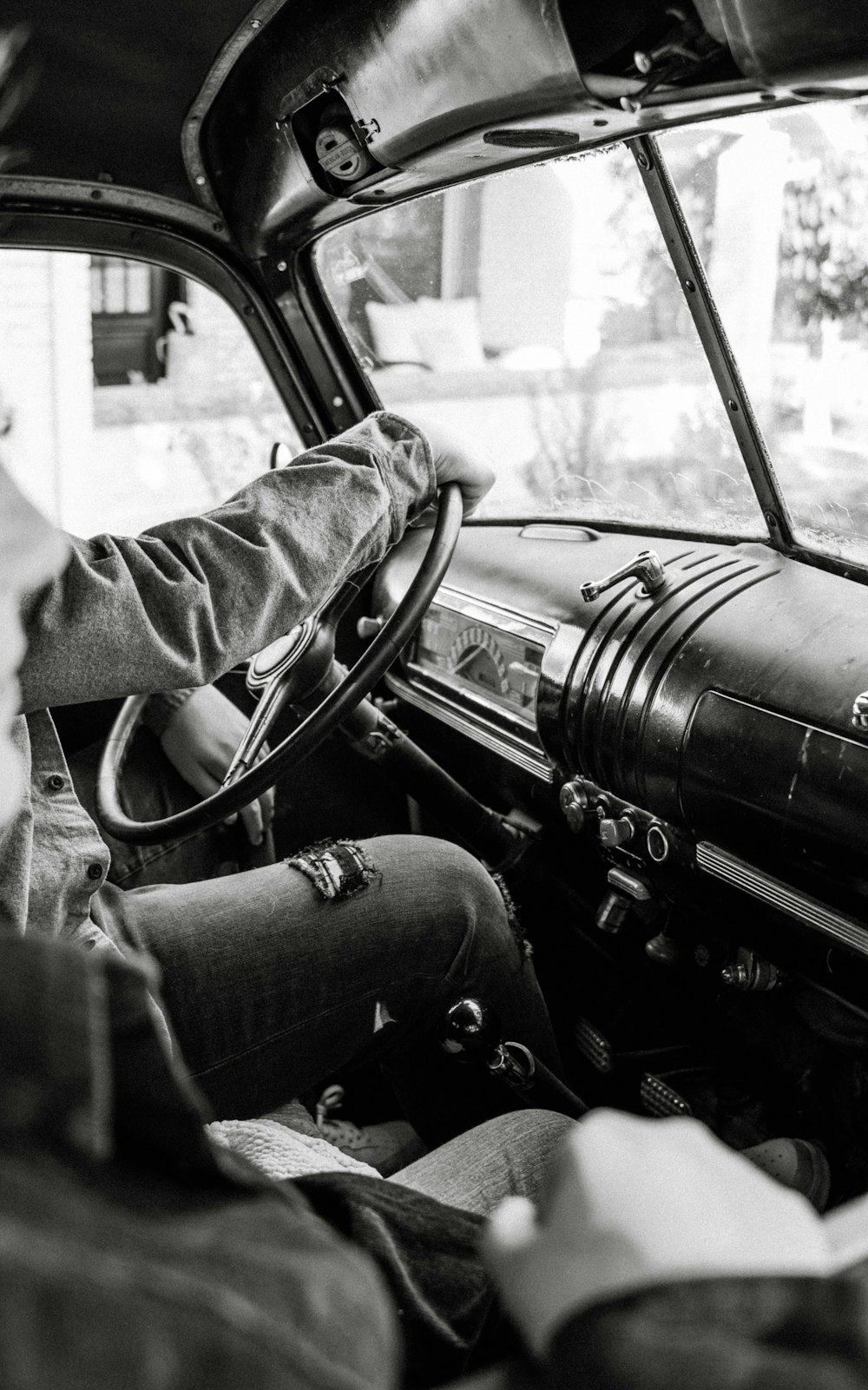 a person sitting in a car