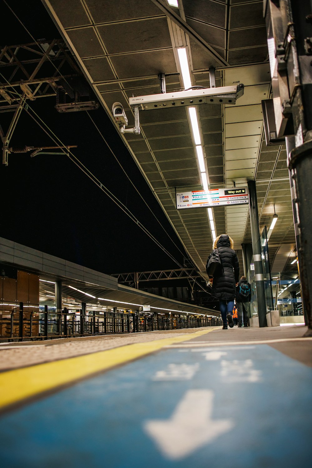 a person walking in a train station