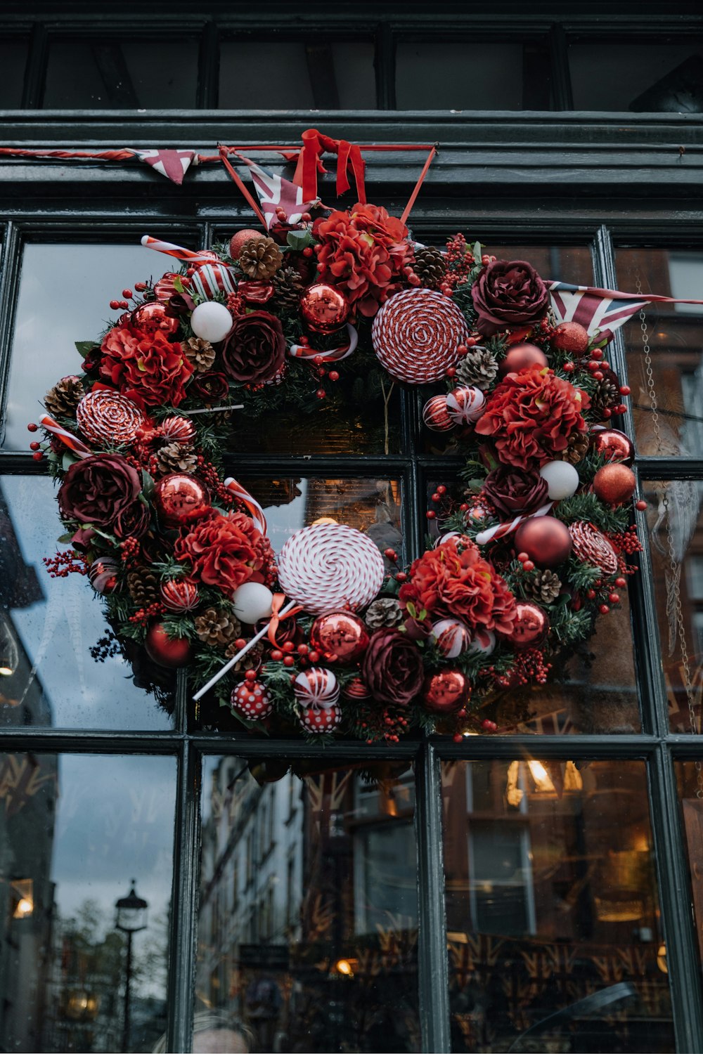 a wreath of red and white flowers