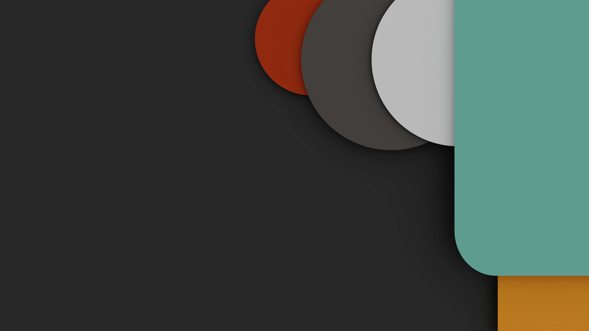 Overlapping rounded shapes in red, grey, white, and teal on a dark background
