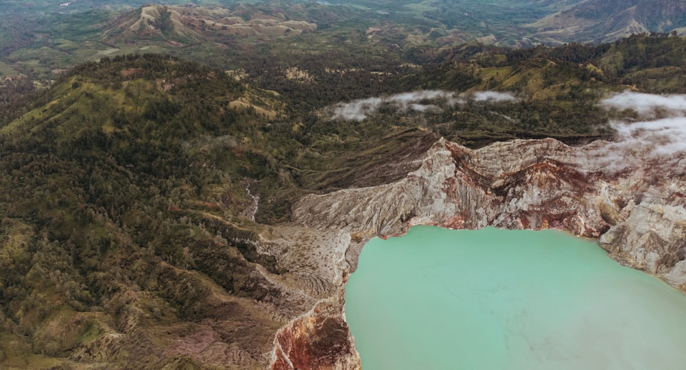 a body of water surrounded by mountains