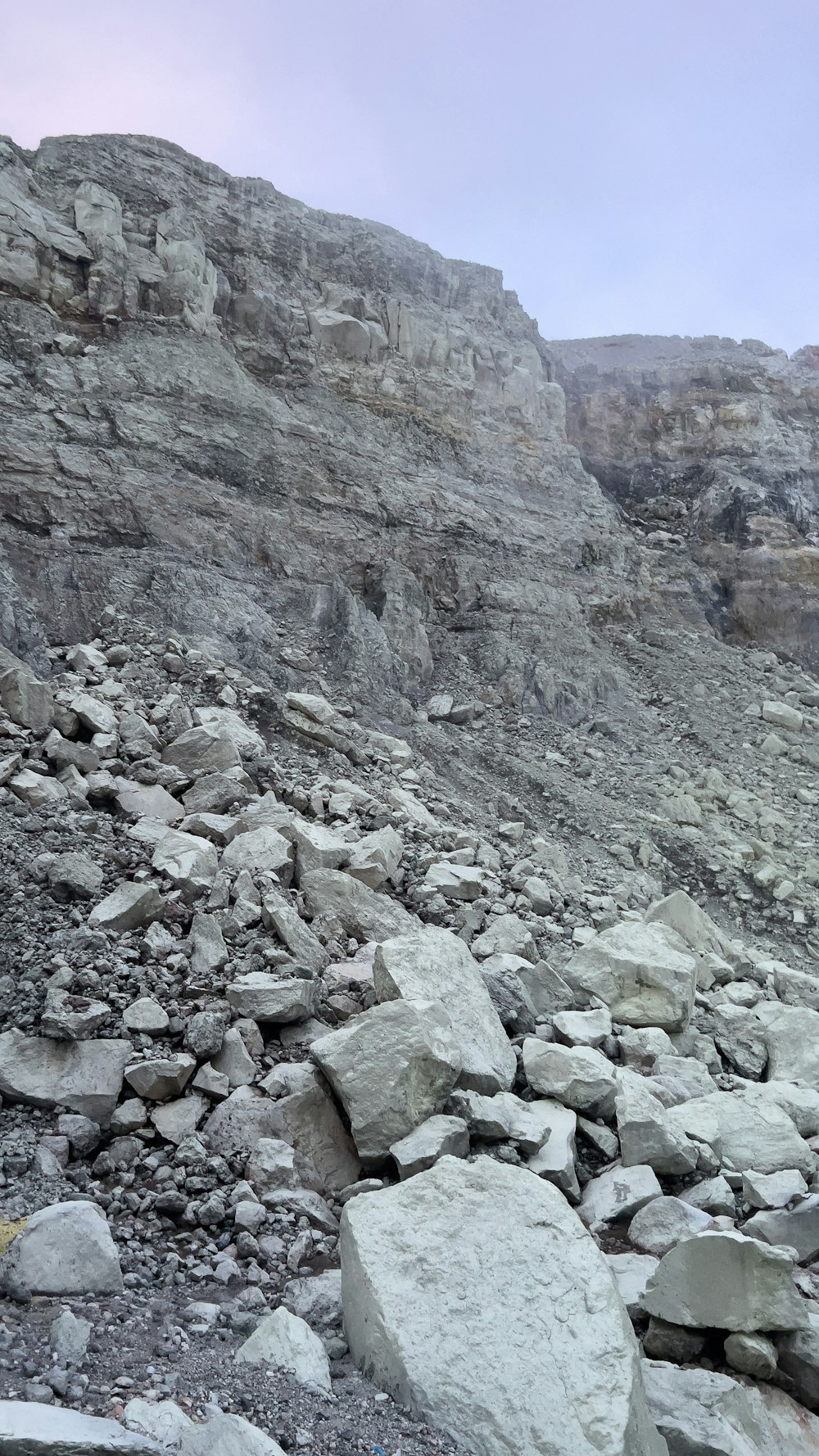 a rocky mountain with a large rock formation